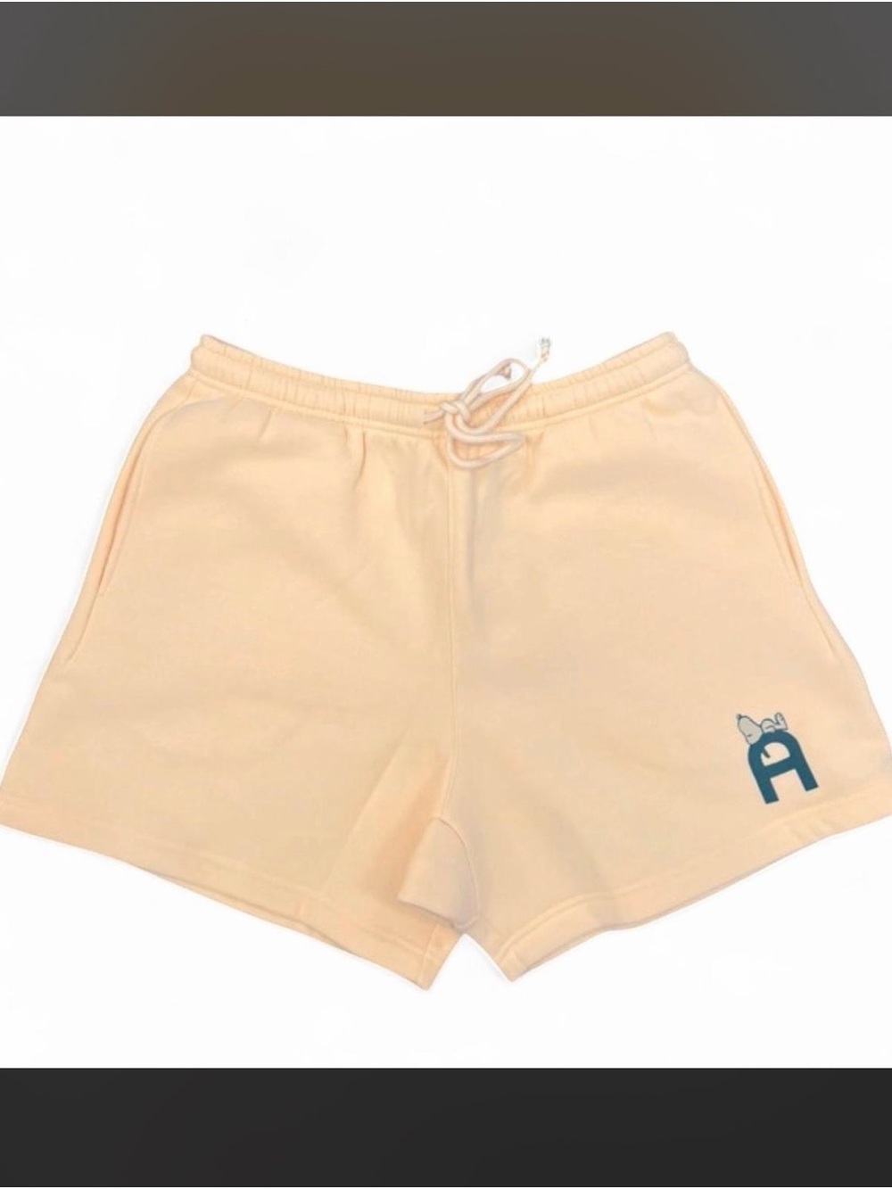 Peanuts Cream Athletic Drawstring Shorts with Blue Logo